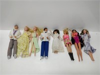 8 vintage barbie dolls