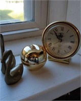 Brass swans apple and clock
