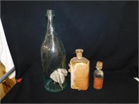 Lg. antique bottle, partial paper label, for the