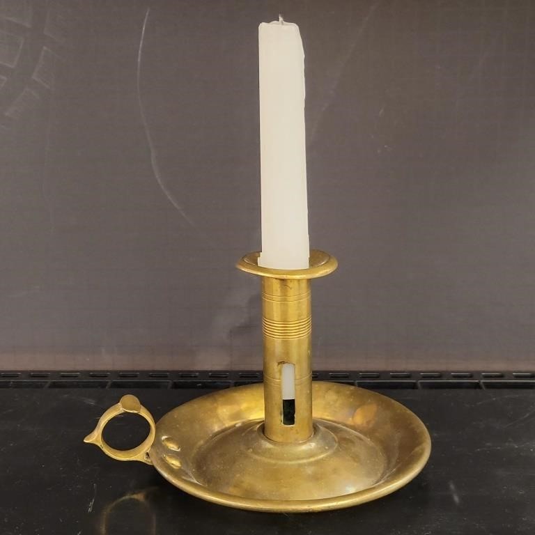 Antique brass candlestick holder