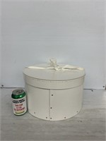 White decorative bin with hat