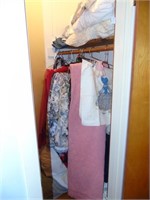 Closet Rack and Shelf of Linens