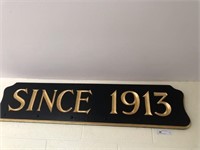 Wooden Sign with Gilt Decorations