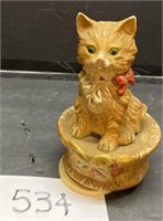 Vintage cat in basket rotating music box