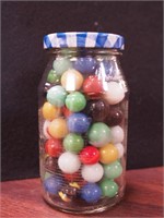 Jar of vintage marbles (some glow)
