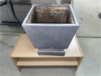 Shoe rack and a square plant pot