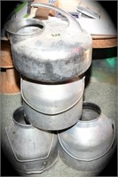 Four Milking Machine Cans