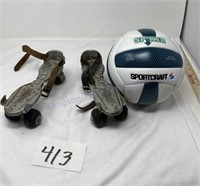 Vintage rollerskates and soccer ball