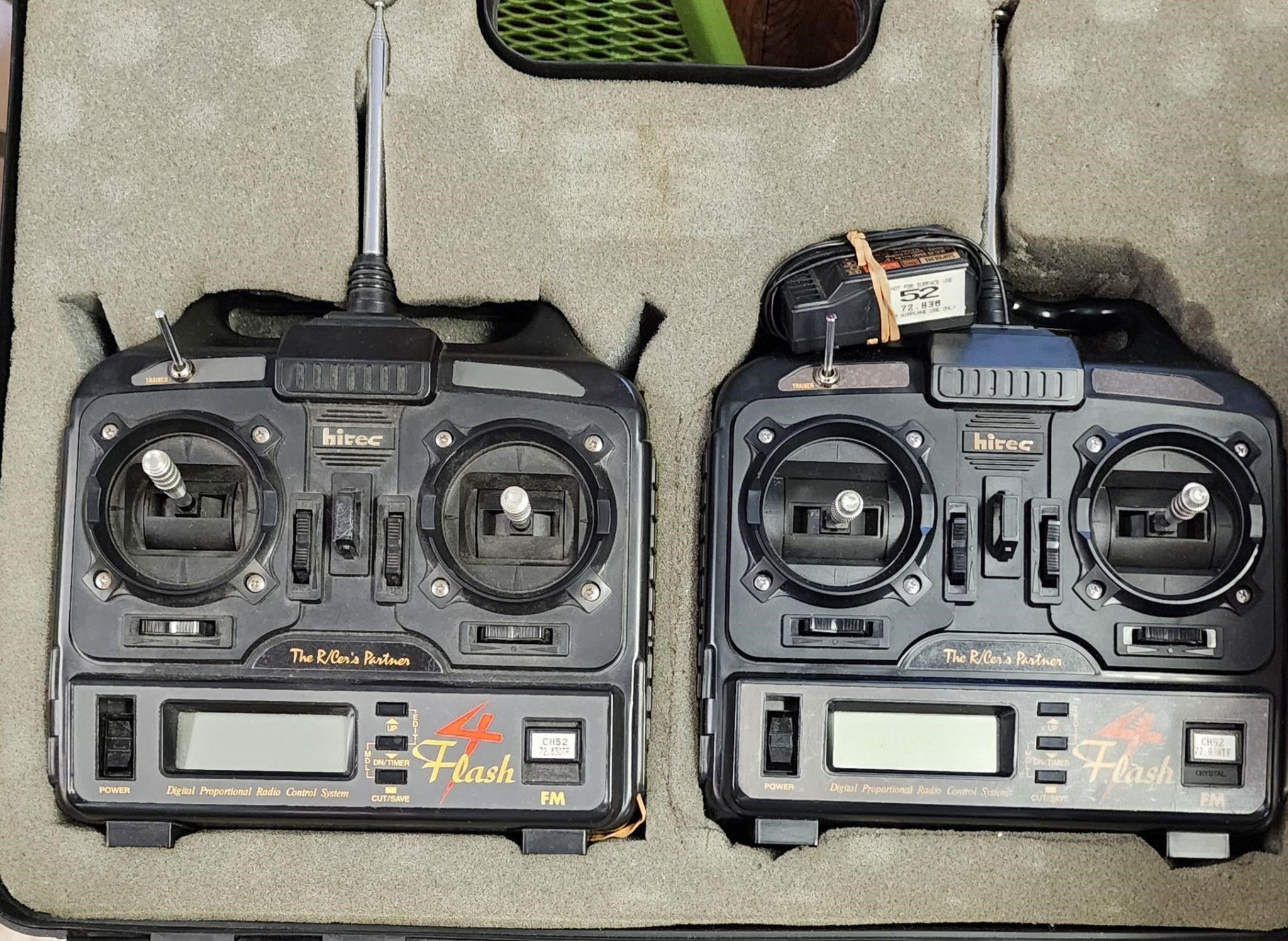 Two Hitec 4 Flash RC Transmitters