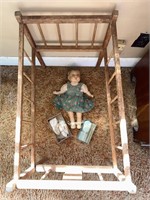Baby doll and bed , vintage baby shoes and hair