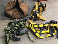Safety harnesses with leather bag