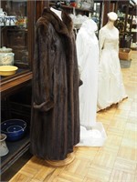 Full-length mahogany mink coat with rolled