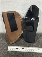 2 PISTOL HOLSTERS, 1 PLASTIC, SZ UNKNOWN