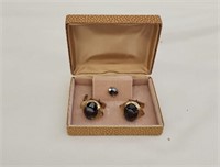 Tie clip and cufflink set.