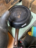 cast-iron 10 1/4 inch skillet with heat rim