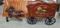cast iron horse, lion & wagon