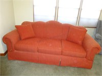 Trendy Salmon Colored Couch by Rockville