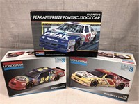 3 Racecar models Peak, Du Pont, Kellogg's