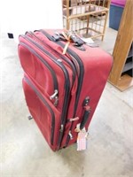 Lg. rolling suitcase, red, lots of compartments,