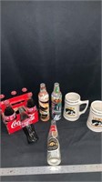 1999 Coca Cola 6-pack / Hawkeye mugs Mountain Dew