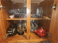 Cabinet lot of muffin pans blender and more