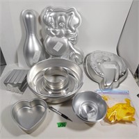 9 Cake mold tins, Various