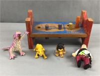 Action figures and cobblers bench
