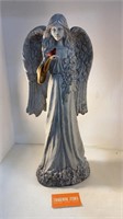 Angel with Cardinal Statue
