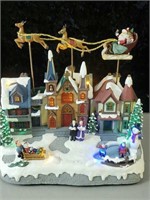 Adorable village piece lights up & plays Jingle
