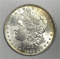 1883-O Morgan Silver $1 Color Toned Uncirculated