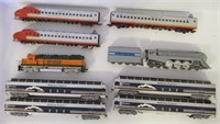 Lot of train engines and cars that includes Play