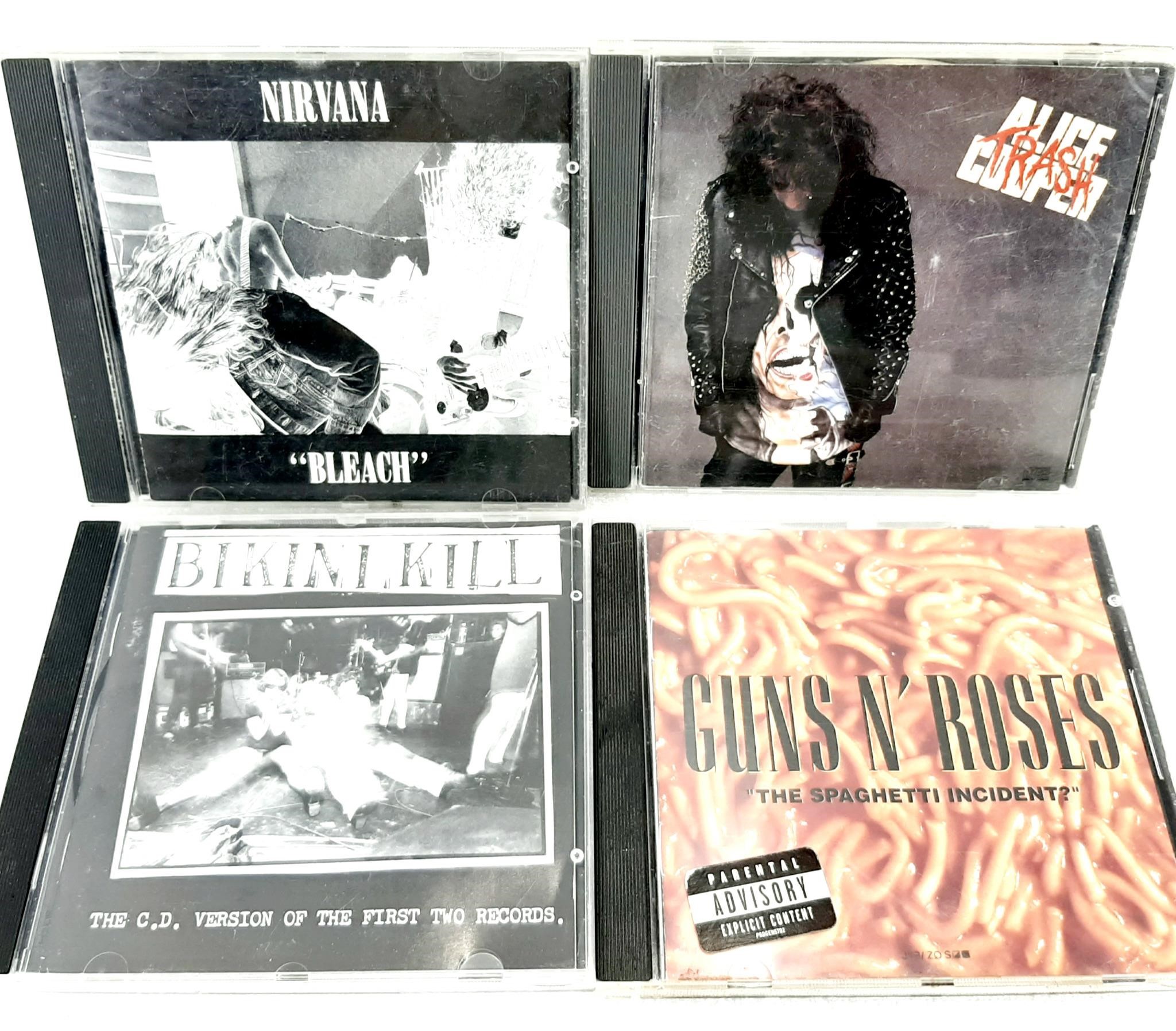 42 CD de musique dont Alice Cooper, Guns N' Roses