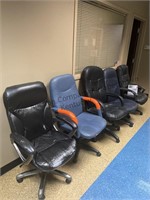Five office chairs and garbage can