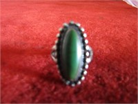 Sterling silver ring. Turquoise, beaded edge.