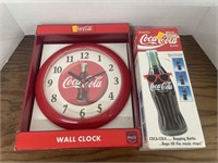 Coca Cola wall clock and bopping bottle