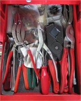 Contents of drawer that includes tubing cutters,