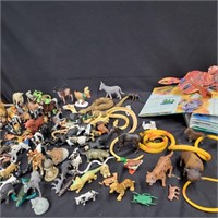 Collection of plastic animals, dinosaurs spiders