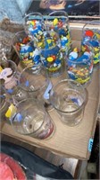 Group of ET and Smurfs collector tumblers