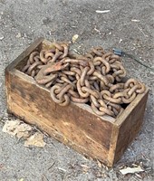 Wood crate full of tow chain
