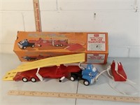 vtg Sears battery-op car transporter toy with box