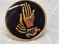 Praying hands pin.