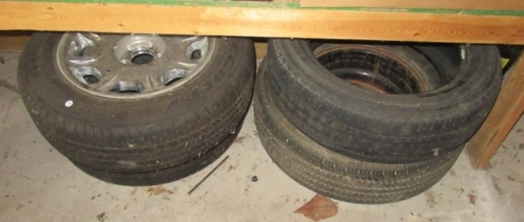 (4) Tires, (2) with rims are Goodyear P215/65R17