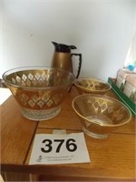 Three 1970s green & gold glass bowls - insulated