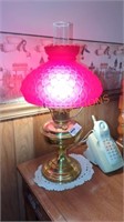 vintage red hurricane style lamp