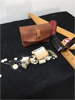 Leather pouch and sewing materials