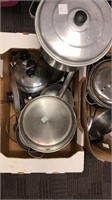 Assorted set of pots, pans, and lids