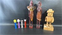 Four PEZ Dispensers, two African hand carved wood