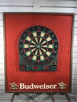 Spalding electronic dart board mounted on framed