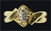 10K Yellow gold round cut three-stone diamond ring