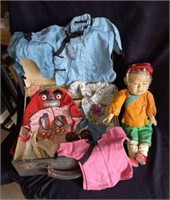 Old Chinese doll w/ garments and case